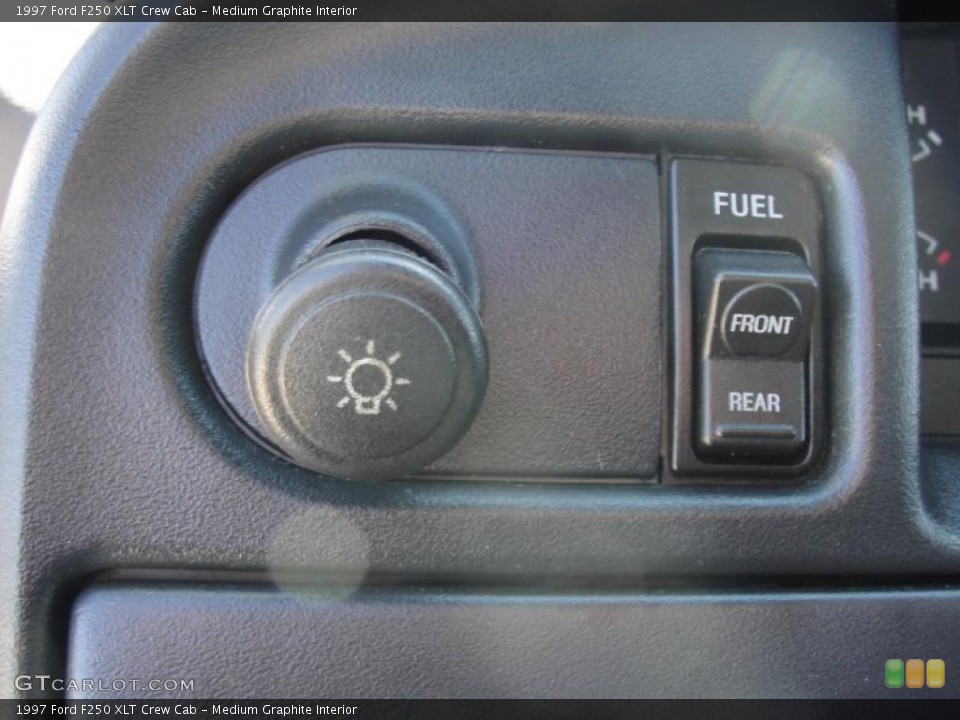 Medium Graphite Interior Controls for the 1997 Ford F250 XLT Crew Cab #46701570