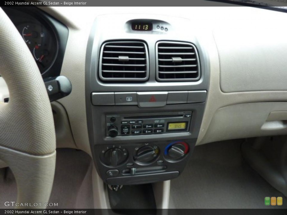 Beige Interior Controls for the 2002 Hyundai Accent GL Sedan #46710369