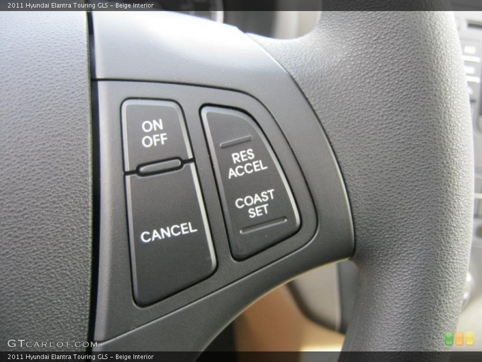 Beige Interior Controls for the 2011 Hyundai Elantra Touring GLS #46711401