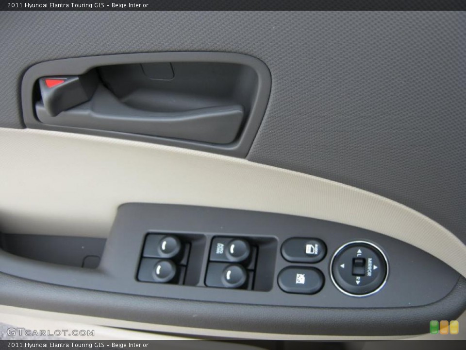 Beige Interior Controls for the 2011 Hyundai Elantra Touring GLS #46711419