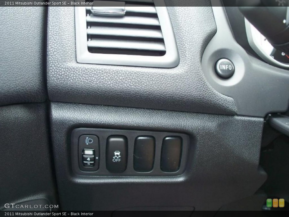 Black Interior Controls for the 2011 Mitsubishi Outlander Sport SE #46718688