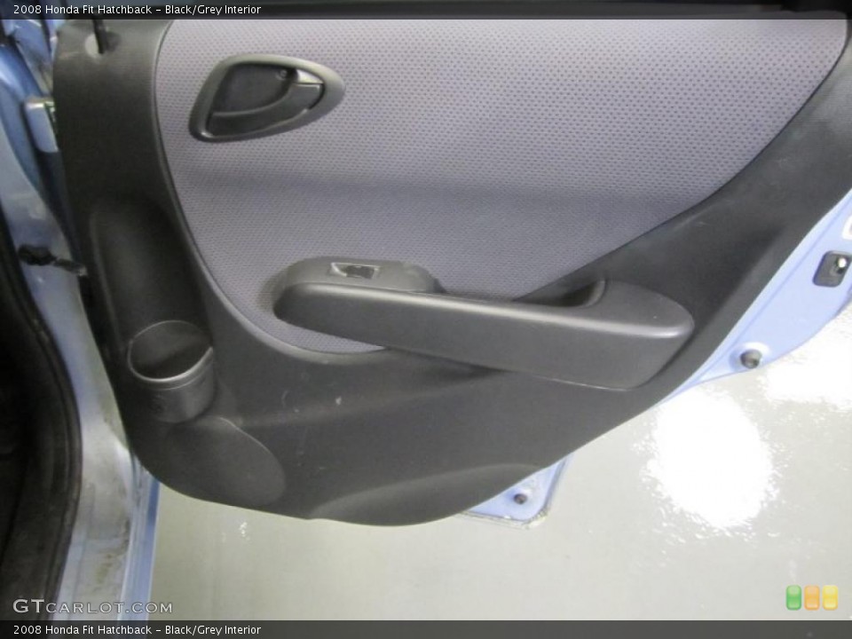 Black/Grey Interior Door Panel for the 2008 Honda Fit Hatchback #46725096