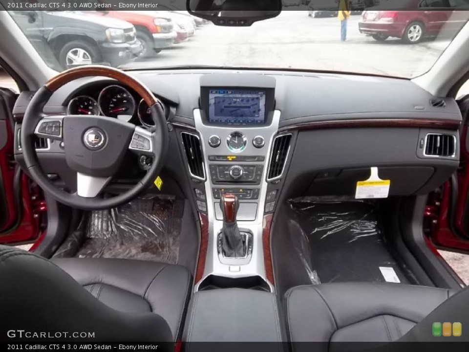 Ebony Interior Dashboard for the 2011 Cadillac CTS 4 3.0 AWD Sedan #46744897