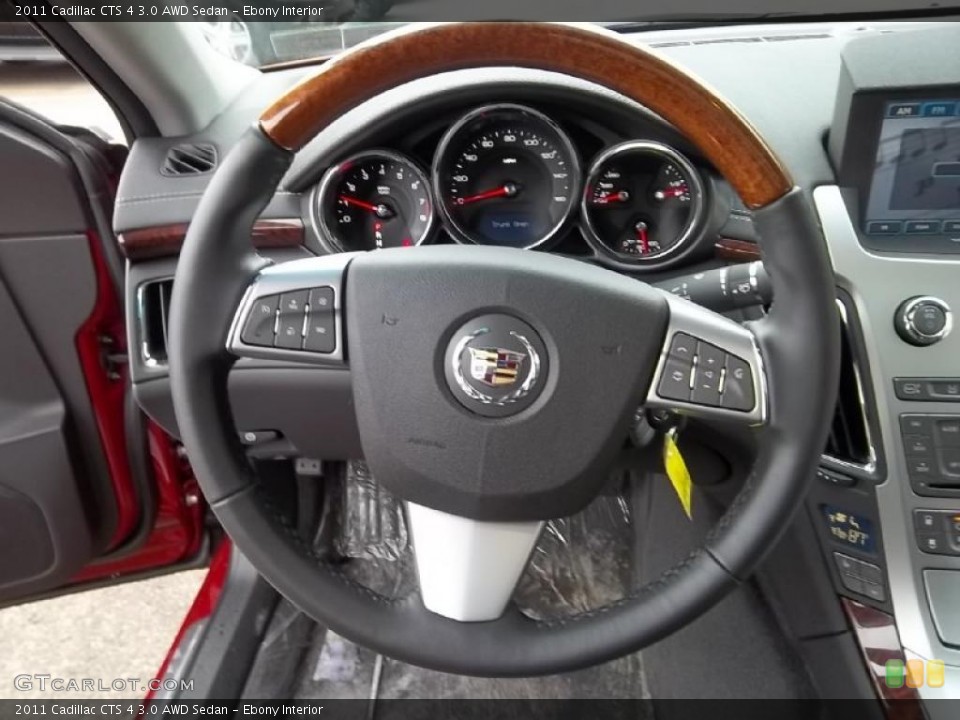 Ebony Interior Steering Wheel for the 2011 Cadillac CTS 4 3.0 AWD Sedan #46744906