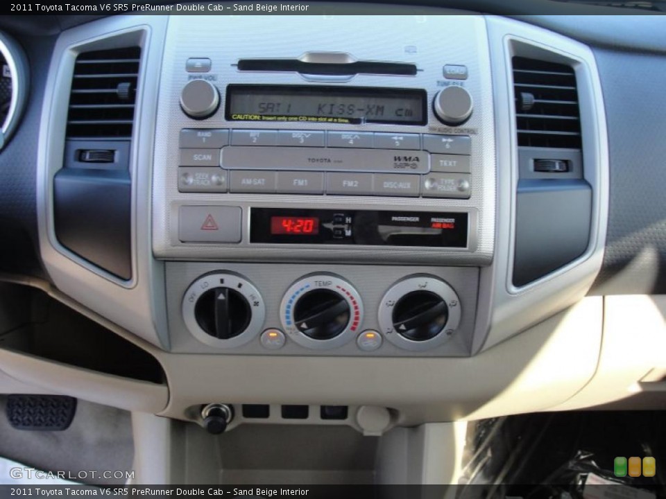 Sand Beige Interior Controls for the 2011 Toyota Tacoma V6 SR5 PreRunner Double Cab #46746782