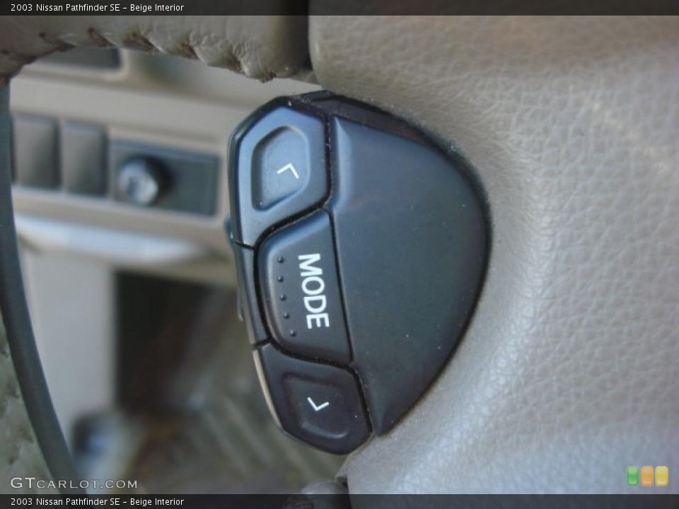 Beige Interior Controls for the 2003 Nissan Pathfinder SE #46769196