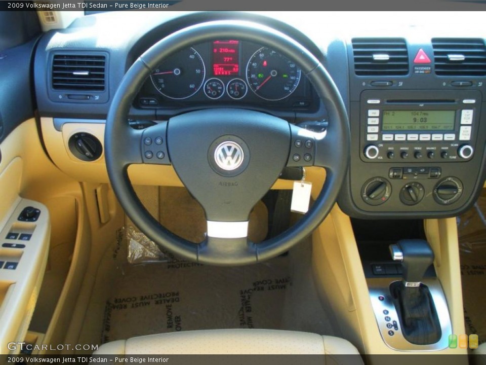 Pure Beige Interior Dashboard for the 2009 Volkswagen Jetta TDI Sedan #46773027