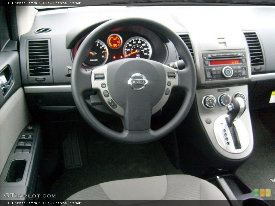 Charcoal Interior Dashboard for the 2011 Nissan Sentra 2.0 SR #46778556