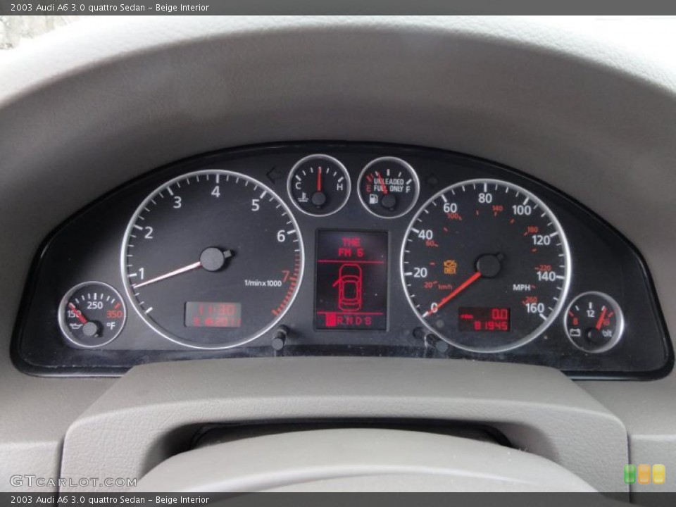 Beige Interior Gauges for the 2003 Audi A6 3.0 quattro Sedan #46806096