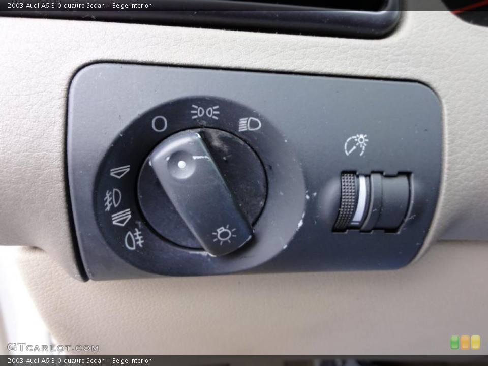 Beige Interior Controls for the 2003 Audi A6 3.0 quattro Sedan #46806174