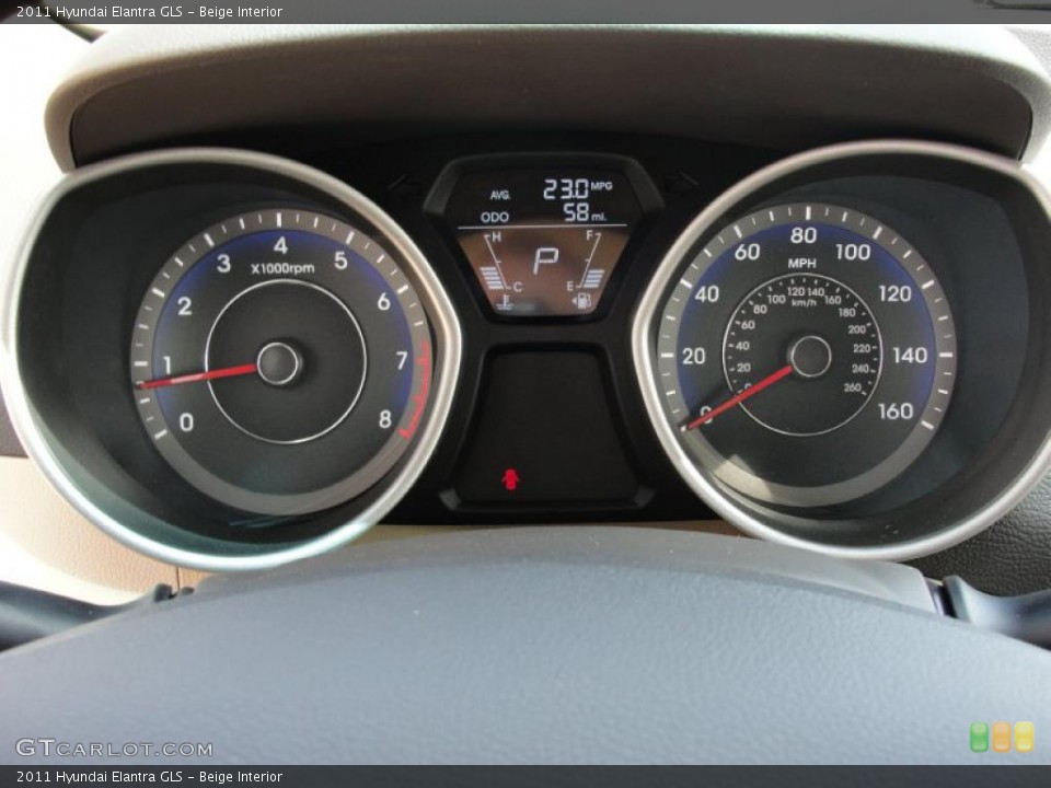 Beige Interior Gauges for the 2011 Hyundai Elantra GLS #46810455