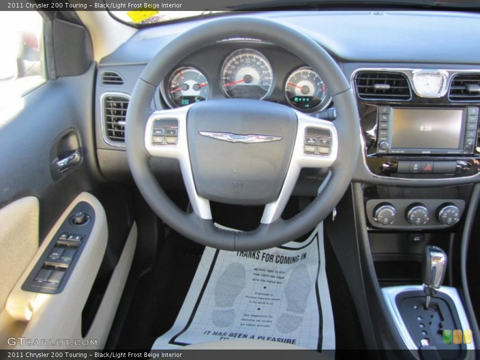 Black/Light Frost Beige Interior Steering Wheel for the 2011 Chrysler 200 Touring #46820178