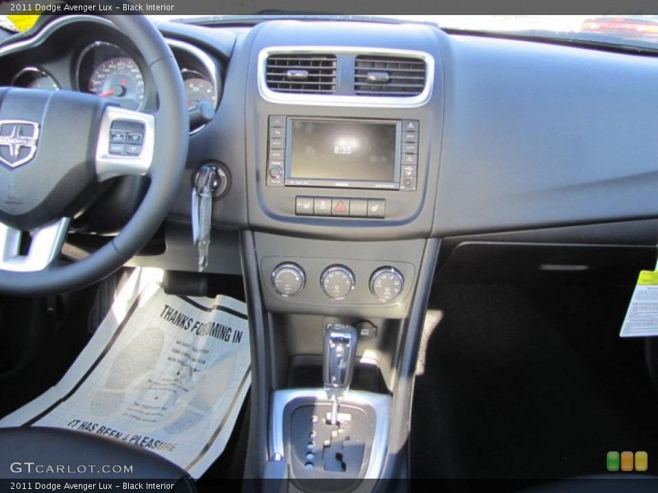 Black Interior Dashboard for the 2011 Dodge Avenger Lux #46826574