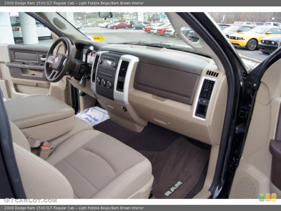 Light Pebble Beige/Bark Brown Interior Dashboard for the 2009 Dodge Ram 1500 SLT Regular Cab #46833462