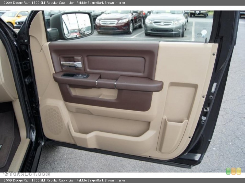 Light Pebble Beige/Bark Brown Interior Door Panel for the 2009 Dodge Ram 1500 SLT Regular Cab #46833474