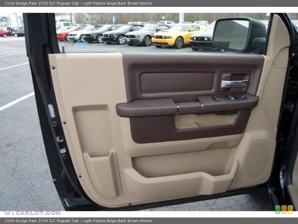 Light Pebble Beige/Bark Brown Interior Door Panel for the 2009 Dodge Ram 1500 SLT Regular Cab #46833561