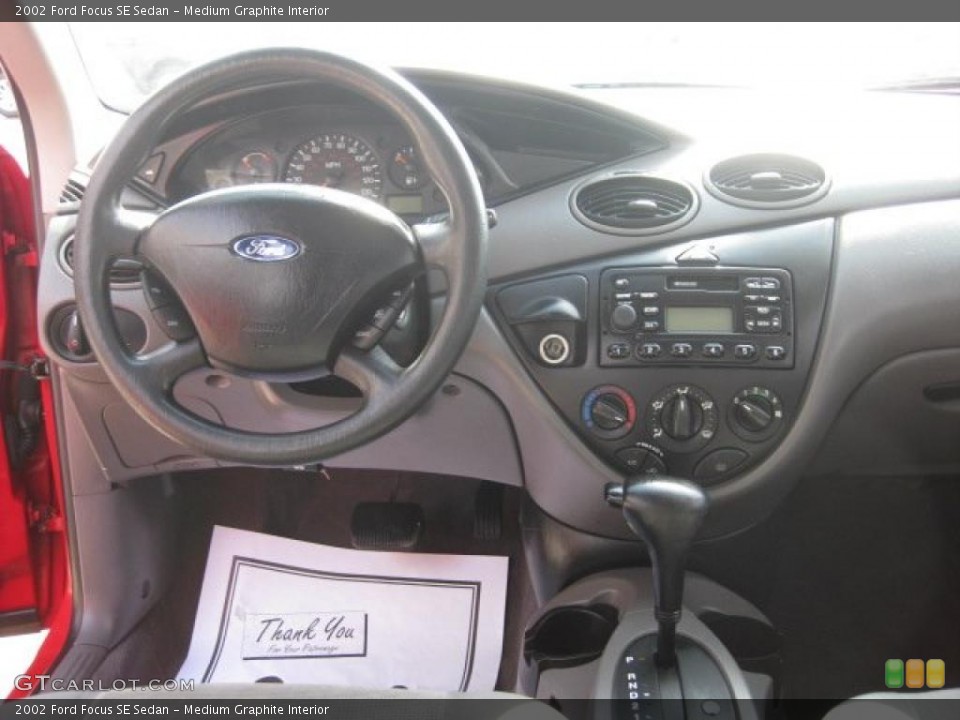 Medium Graphite Interior Dashboard for the 2002 Ford Focus SE Sedan #46844721