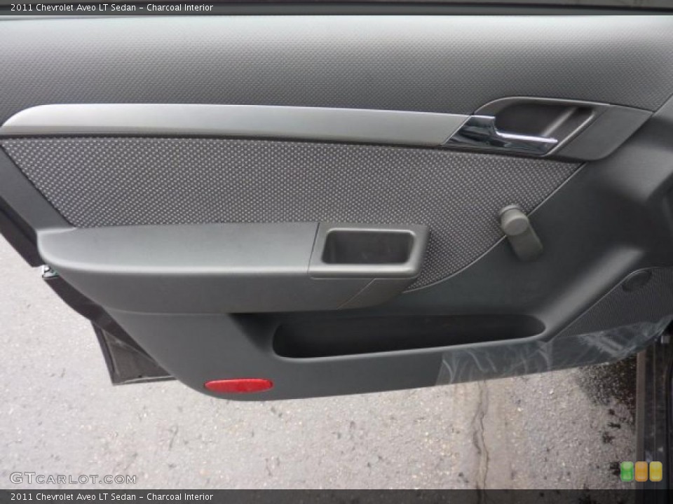 Charcoal Interior Door Panel for the 2011 Chevrolet Aveo LT Sedan #46845755