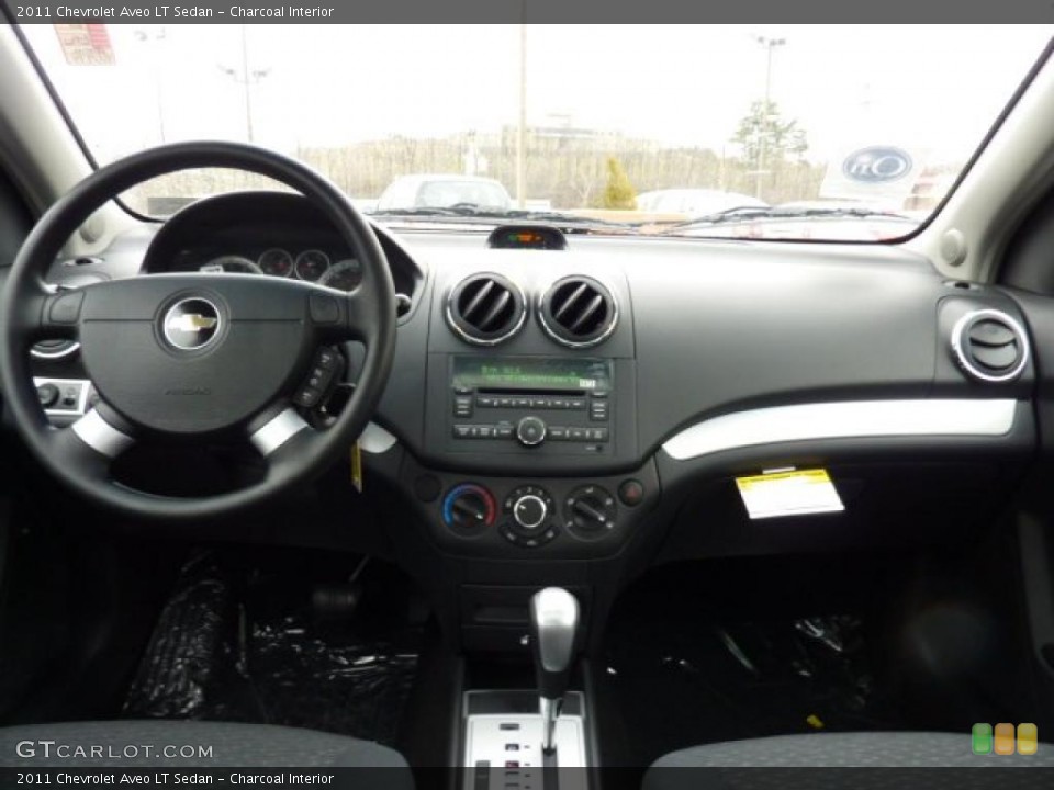 Charcoal Interior Dashboard for the 2011 Chevrolet Aveo LT Sedan #46846221