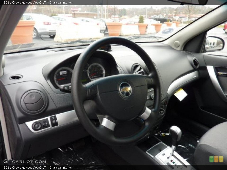 Charcoal Interior Steering Wheel for the 2011 Chevrolet Aveo Aveo5 LT #46846893