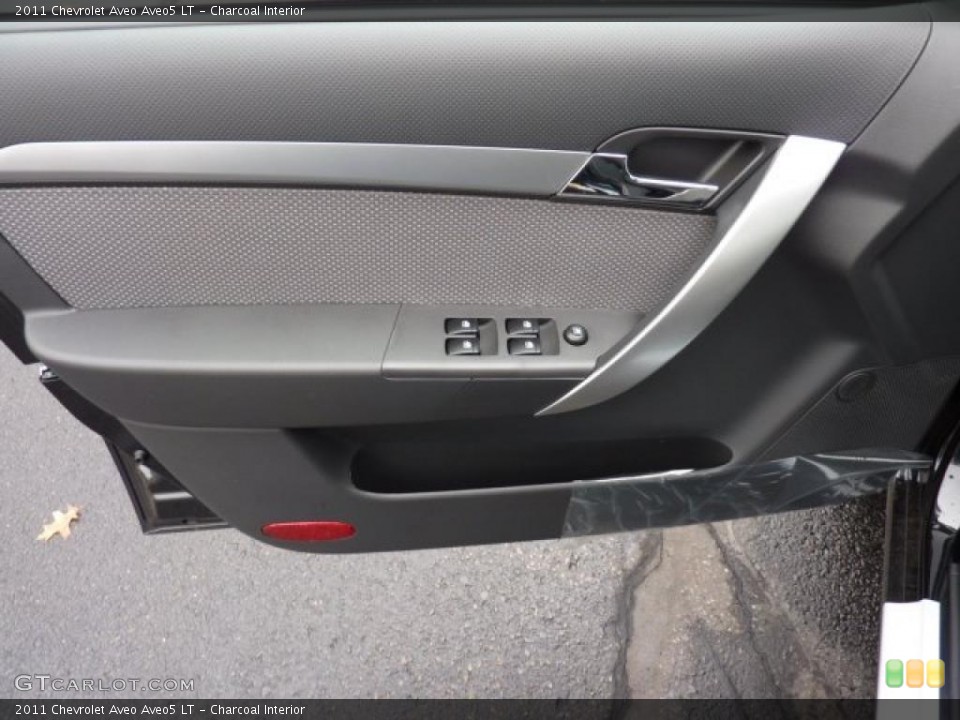 Charcoal Interior Door Panel for the 2011 Chevrolet Aveo Aveo5 LT #46846908