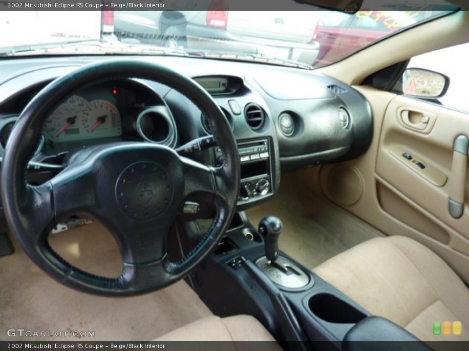 Beige/Black Interior Photo for the 2002 Mitsubishi Eclipse RS Coupe #46854829