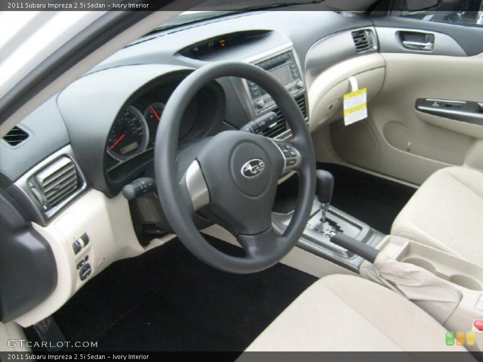 Ivory Interior Prime Interior for the 2011 Subaru Impreza 2.5i Sedan #46866378