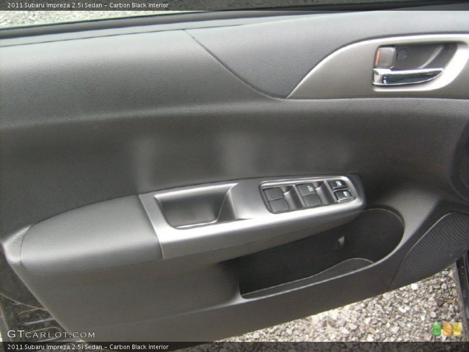 Carbon Black Interior Door Panel for the 2011 Subaru Impreza 2.5i Sedan #46866627