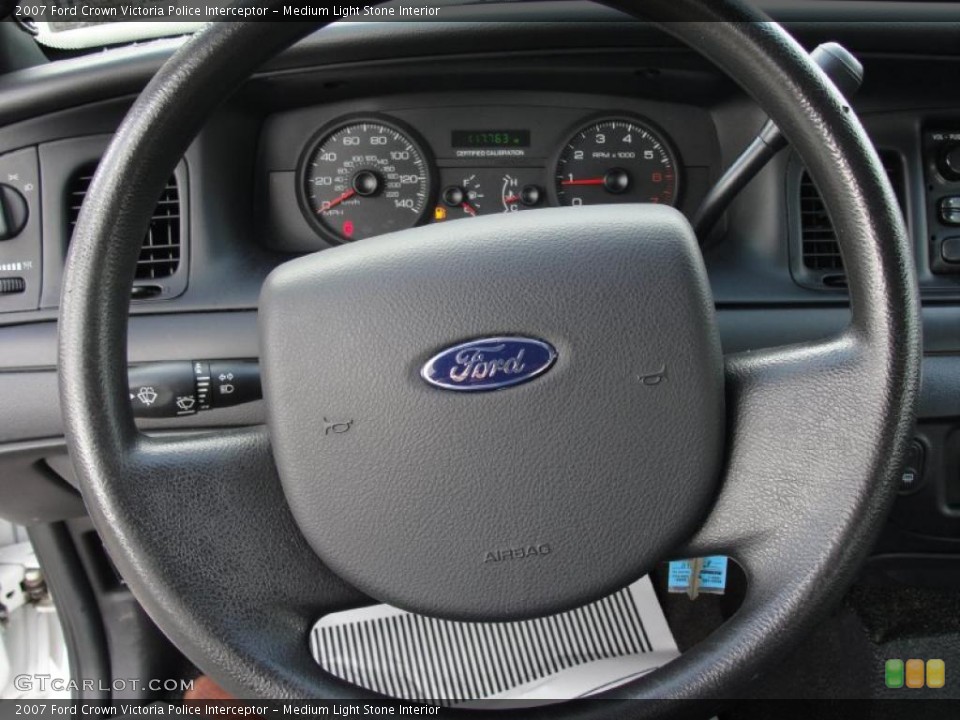 Medium Light Stone Interior Steering Wheel for the 2007 Ford Crown Victoria Police Interceptor #46884344