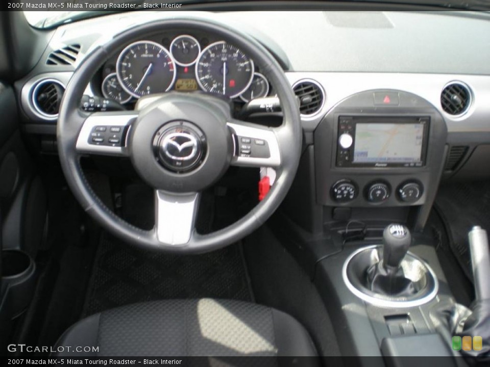 Black Interior Dashboard for the 2007 Mazda MX-5 Miata Touring Roadster #46909142