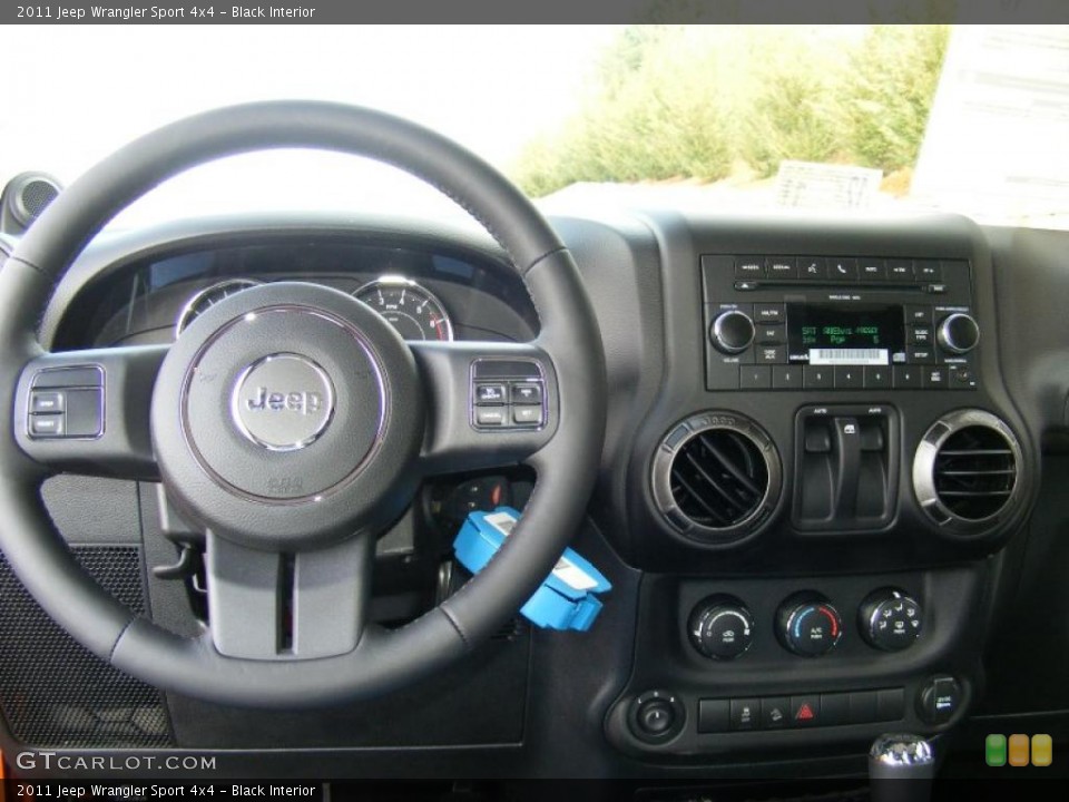 Black Interior Dashboard for the 2011 Jeep Wrangler Sport 4x4 #46927904