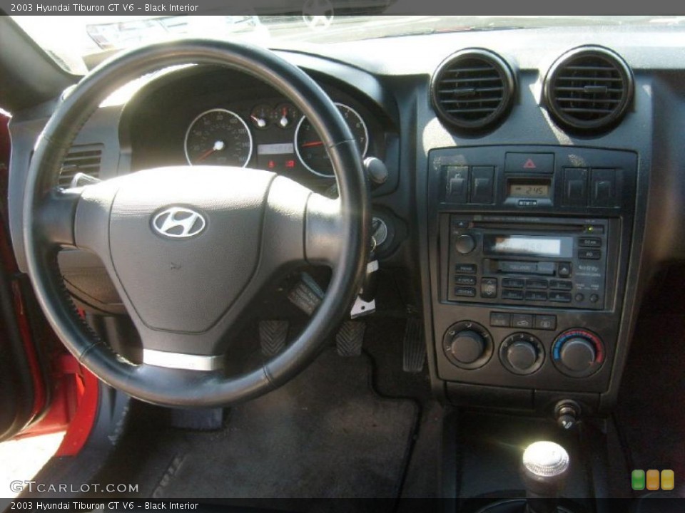 Black Interior Dashboard for the 2003 Hyundai Tiburon GT V6 #46934651