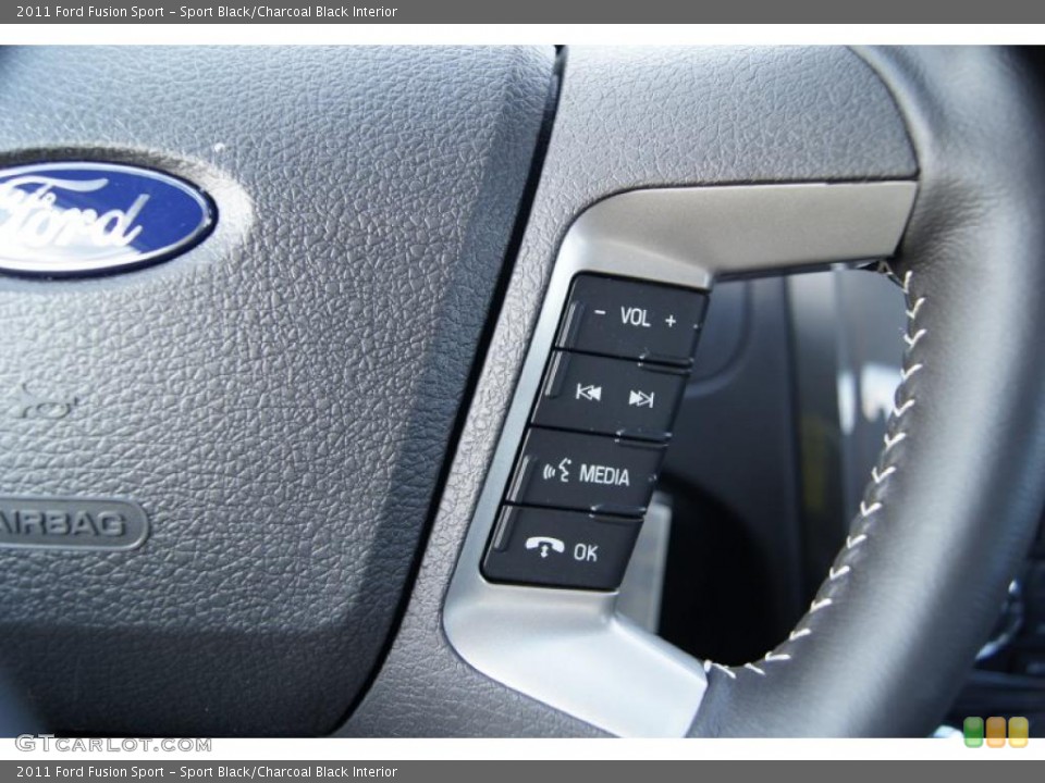 Sport Black/Charcoal Black Interior Controls for the 2011 Ford Fusion Sport #46942944
