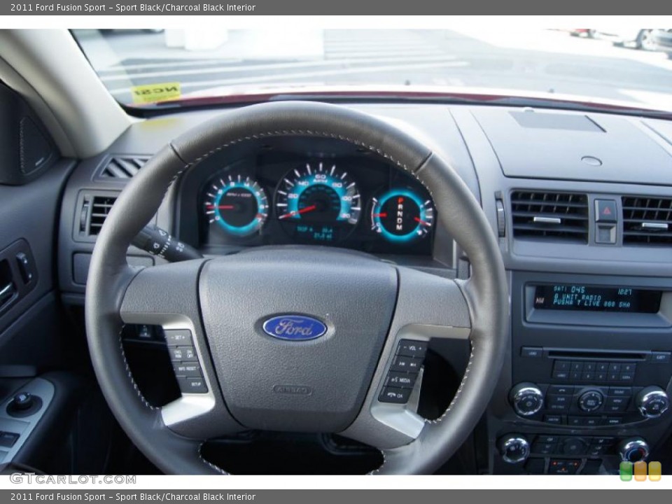 Sport Black/Charcoal Black Interior Steering Wheel for the 2011 Ford Fusion Sport #46942962