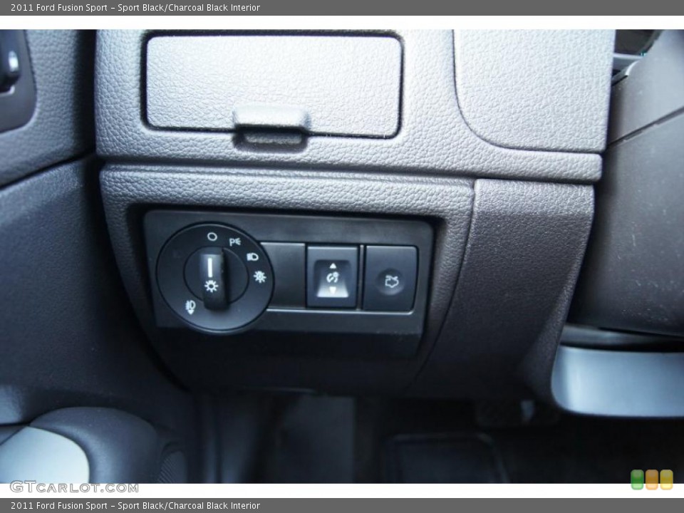 Sport Black/Charcoal Black Interior Controls for the 2011 Ford Fusion Sport #46943094