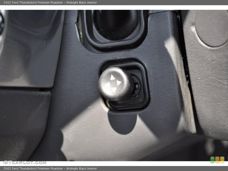 Midnight Black Interior Controls for the 2002 Ford Thunderbird Premium Roadster #46943103