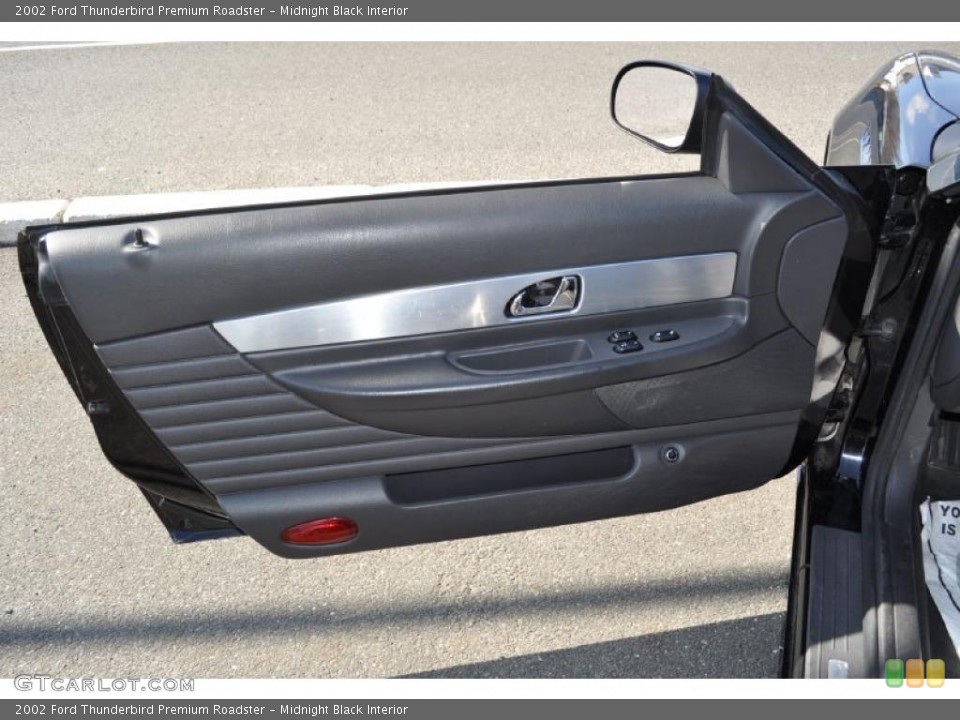 Midnight Black Interior Door Panel for the 2002 Ford Thunderbird Premium Roadster #46943160