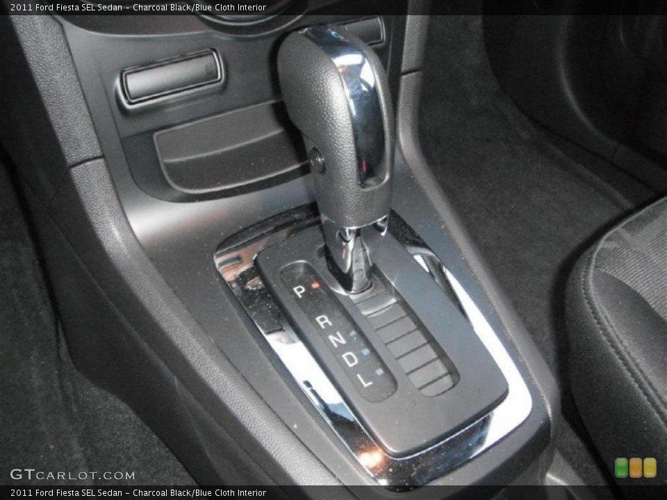 Charcoal Black/Blue Cloth Interior Transmission for the 2011 Ford Fiesta SEL Sedan #46953390