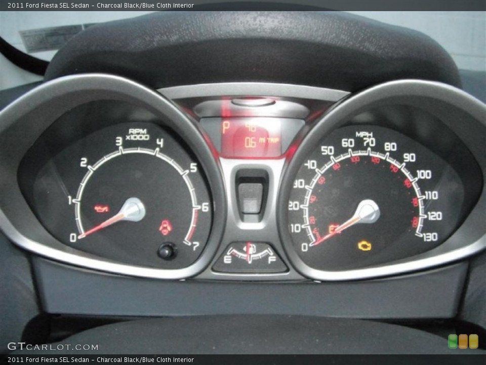 Charcoal Black/Blue Cloth Interior Gauges for the 2011 Ford Fiesta SEL Sedan #46953417