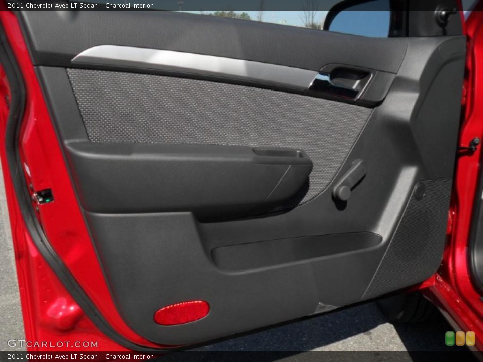 Charcoal Interior Door Panel for the 2011 Chevrolet Aveo LT Sedan #46963959