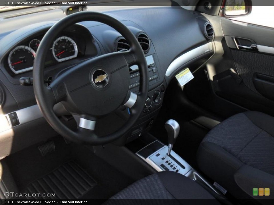 Charcoal Interior Prime Interior for the 2011 Chevrolet Aveo LT Sedan #46964226