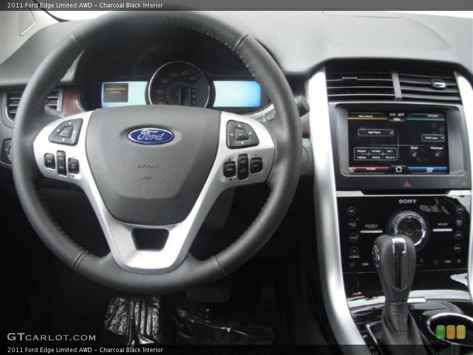 Charcoal Black Interior Steering Wheel for the 2011 Ford Edge Limited AWD #46984086