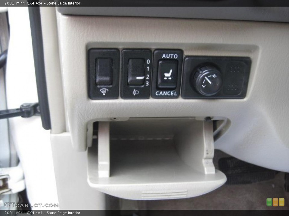 Stone Beige Interior Controls for the 2001 Infiniti QX4 4x4 #47001414
