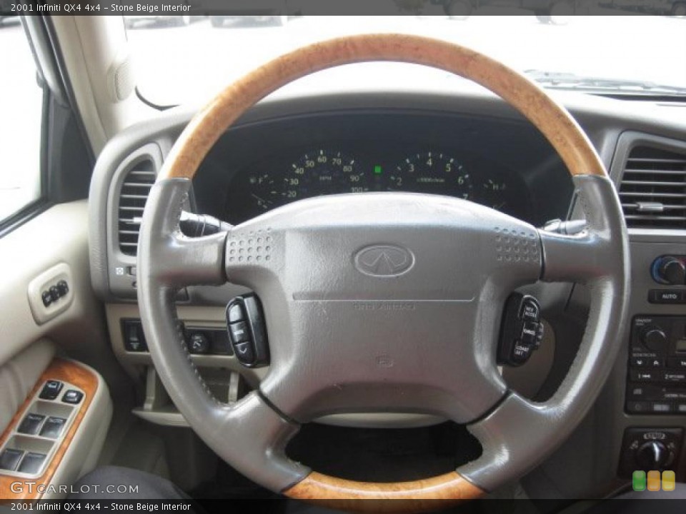 Stone Beige Interior Steering Wheel for the 2001 Infiniti QX4 4x4 #47001444