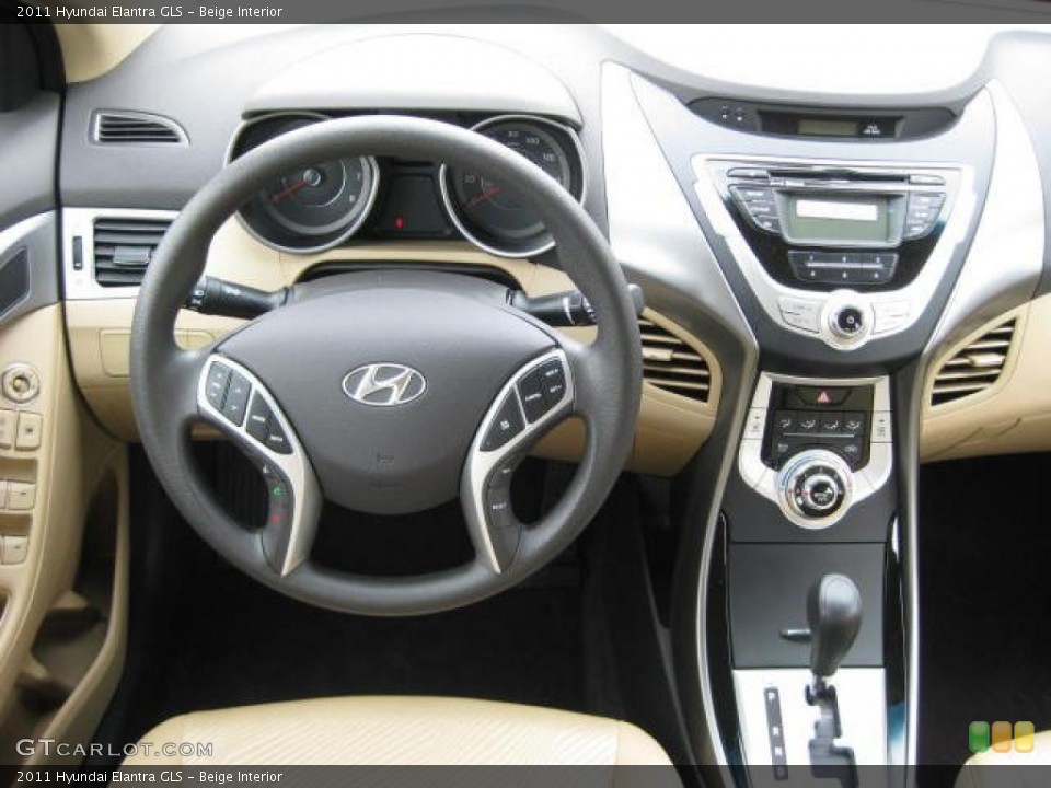 Beige Interior Dashboard for the 2011 Hyundai Elantra GLS #47007927