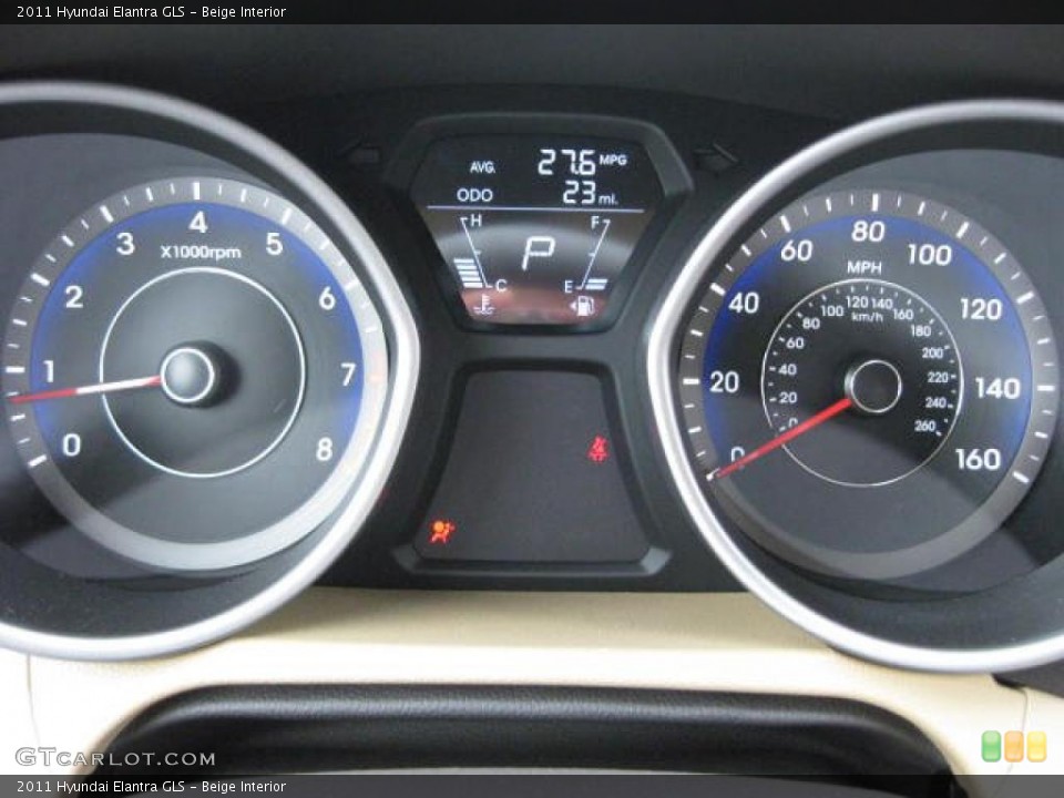 Beige Interior Gauges for the 2011 Hyundai Elantra GLS #47007996