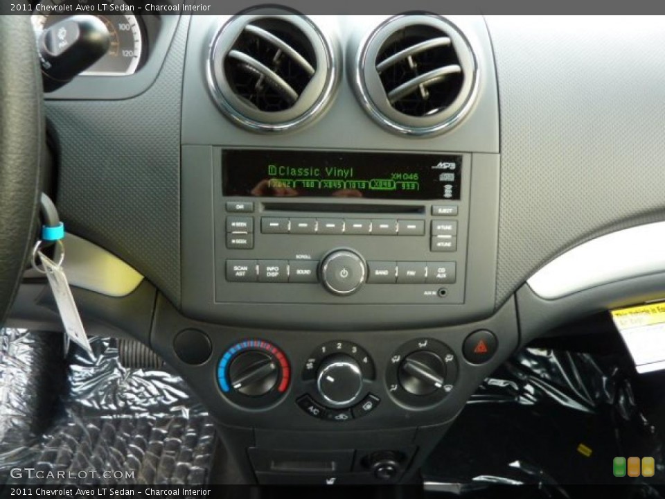 Charcoal Interior Controls for the 2011 Chevrolet Aveo LT Sedan #47008311