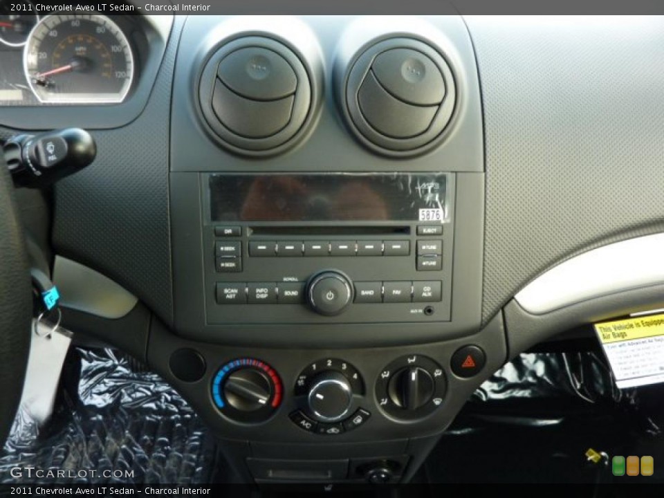 Charcoal Interior Controls for the 2011 Chevrolet Aveo LT Sedan #47010342