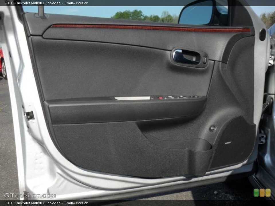 Ebony Interior Door Panel for the 2010 Chevrolet Malibu LTZ Sedan #47020218