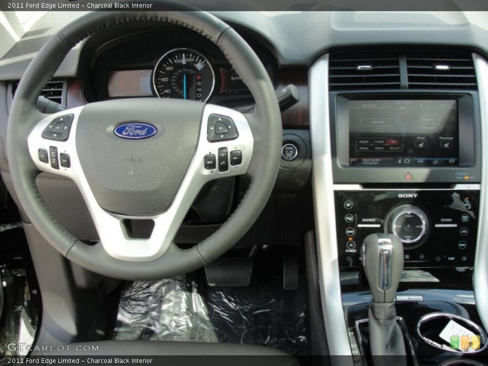 Charcoal Black Interior Steering Wheel for the 2011 Ford Edge Limited #47023854